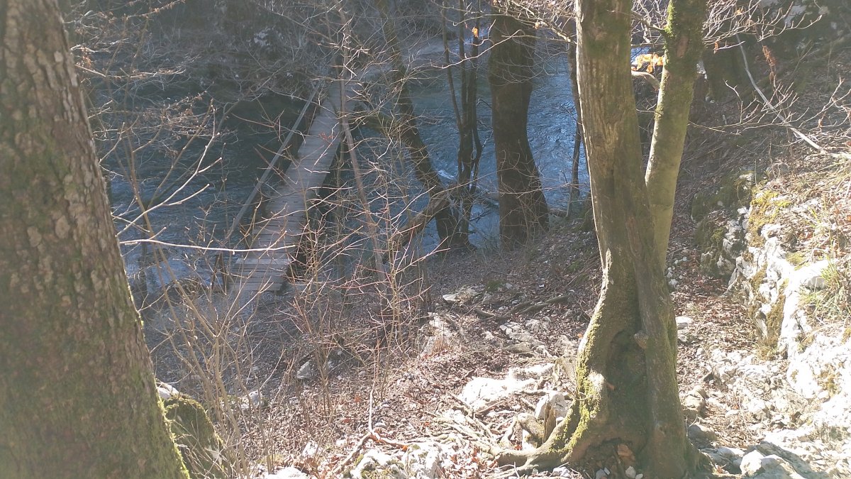 Hiking up the river, this will be your first view of the wooden bridge, scramble down or walk around the side..