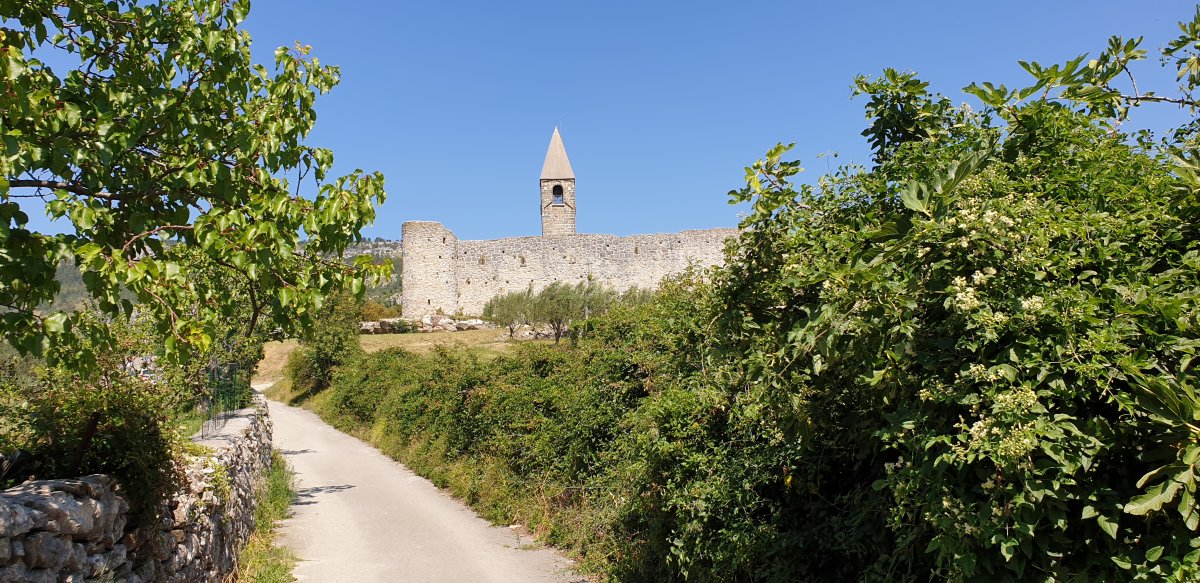 there is nothing like this fortress protecting a church protecting a rare Medieval Fresco..
