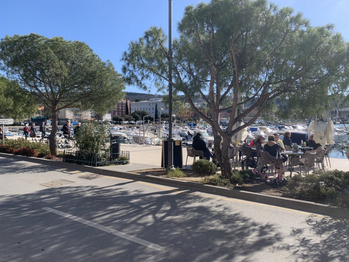 the harbour promenade lined with cafes..